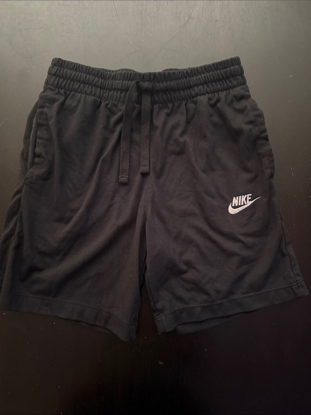 Nike Men's Black Athletic Shorts with White Swoosh